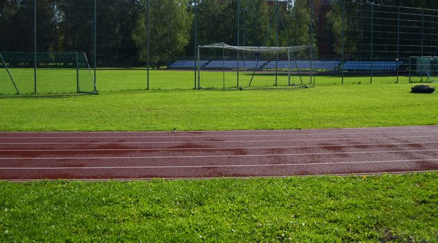 Red racetrack on the stadium in Riga