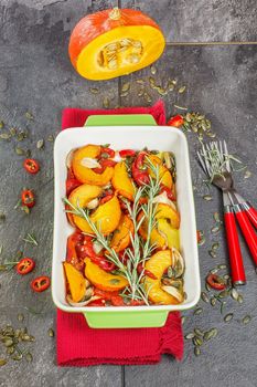 roasted pumpkin with red peppers, spices and herbs
