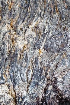 Stripes of stone texture in nature that is water erosion.