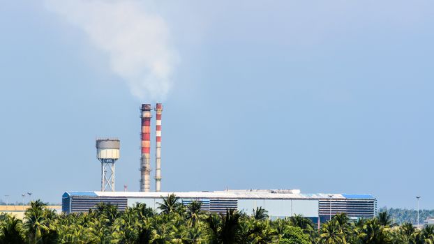Old factory small with smoke stacks in rural Thailand
