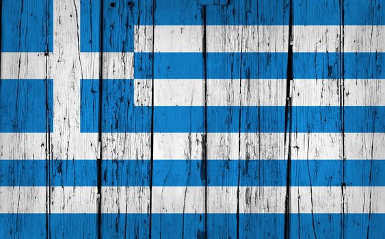 Greece grunge wood background with Greek flag painted on aged wooden wall.
