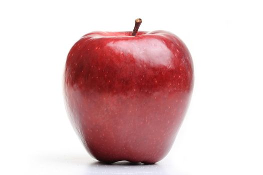 individual strong, red apple with white background
