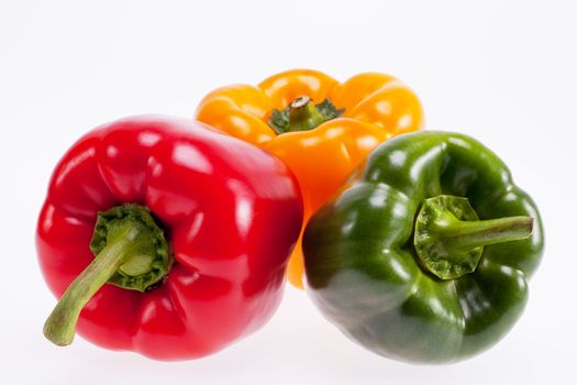 colorful peppers isolated on white background