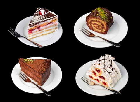 Cakes on plates with forks isolated on black