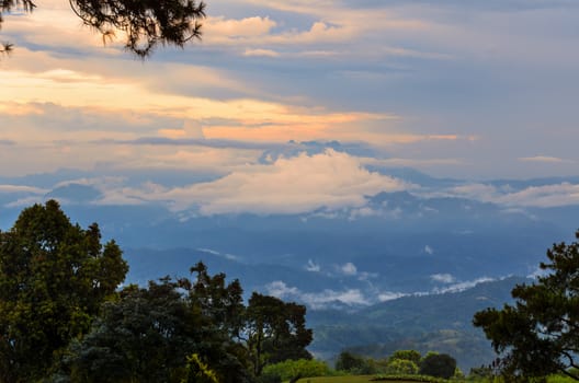 Sunset high mountain range view from viewpoint at Huai Nam Dang national park in Chiang Mai province of Thailand