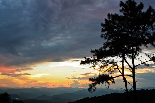Sunset over high mountain range at viewpoint in Huai Nam Dang national park in Chiang Mai and Mae Hong Son of Thailand