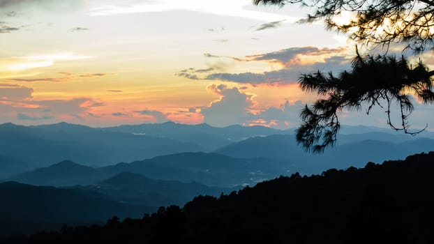 Sunset over high mountain range at viewpoint in Huai Nam Dang national park in Chiang Mai and Mae Hong Son of Thailand
