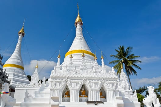 White pagoda architecture at Wat Phra That Doi Kong Mu Temple in Mae Hong Son Province of northern Thailand.