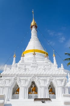 White pagoda architecture at Wat Phra That Doi Kong Mu Temple in Mae Hong Son Province of northern Thailand.