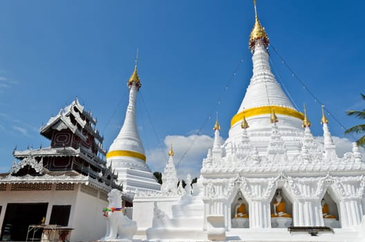 White pagoda architecture at Wat Phra That Doi Kong Mu Temple in Mae Hong Son Province of northern Thailand.