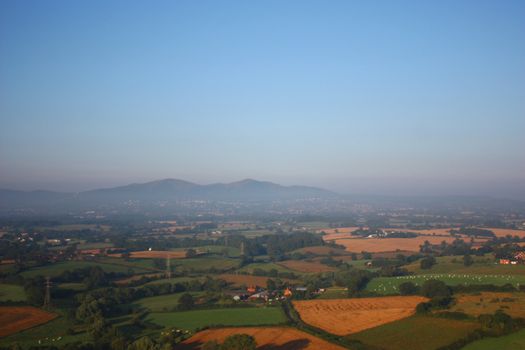 The malvern hills through mist from the air