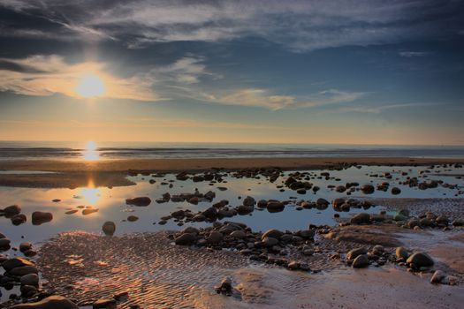 Beautiful sunset over a quiet calm ocean