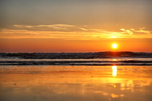 Beautiful sunset over a quiet calm ocean