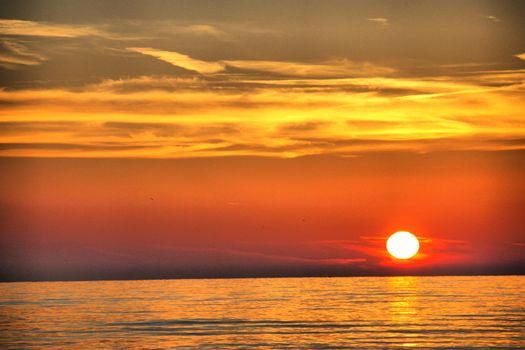 Beautiful sunset over a quiet calm ocean