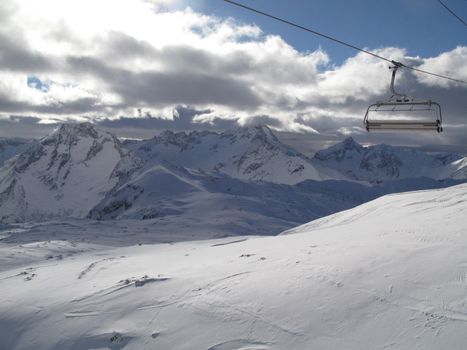 snow covered mountain peaks in the alps