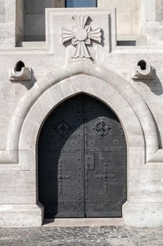 Detailed view of a medieval cathedral door.