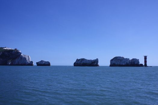 The red and white striped lighthouse at the needles in the solent