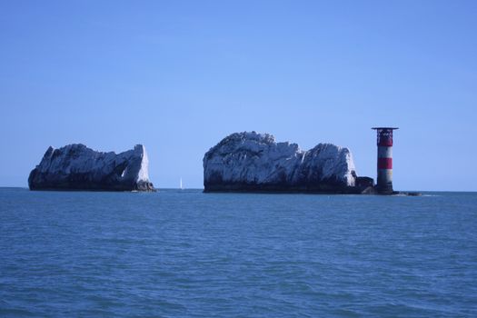 The red and white striped lighthouse at the needles in the solent