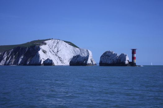 The red and white striped lighthouse at the needles in the solent