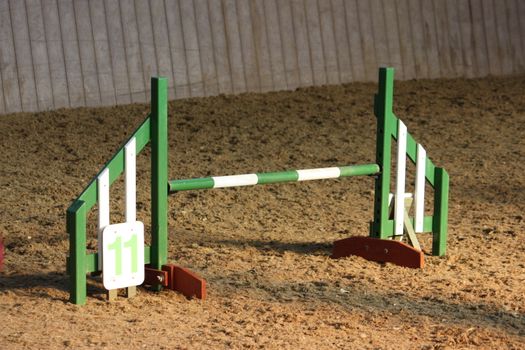 a green and white agility jump