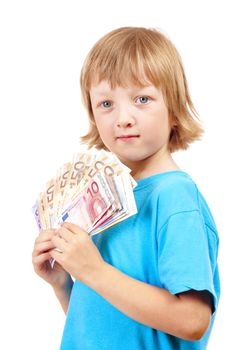 BOY WITH BLOND HAIR HOLDING UP EURO BANKNOTES.