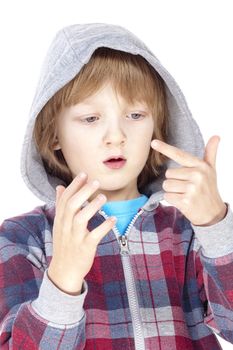 boy with blond hair counting on fingers of his hand - isolated on white