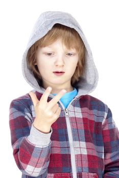 boy with blond hair counting on fingers of his hand - isolated on white