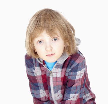 portrait of a boy with blond hair - isolated on white