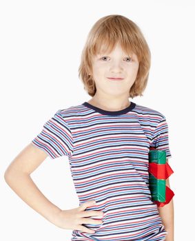 Boy Holding a Present - Isolated on White