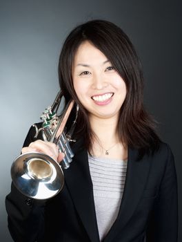 Portrait of a Female Trumpet Player - Isolated on White