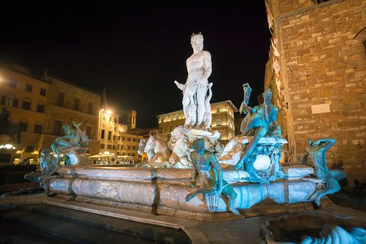 Pisa, Italy - August 11, 2013: Night view of illuminated Neptune fountain in Florence, Italy