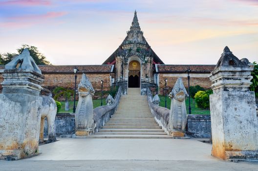 Front arched entrance of Wat Phra That Lampang Luang temple in Lampang province northern Thailand