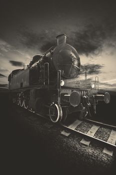 Picture of an ancient locomotive with brown tones