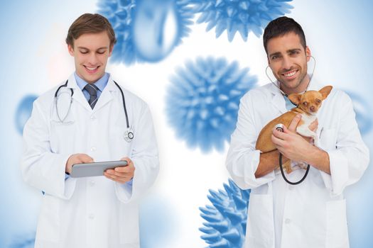 Composite image of happy doctor and vet with stethoscope against blue virus cells
