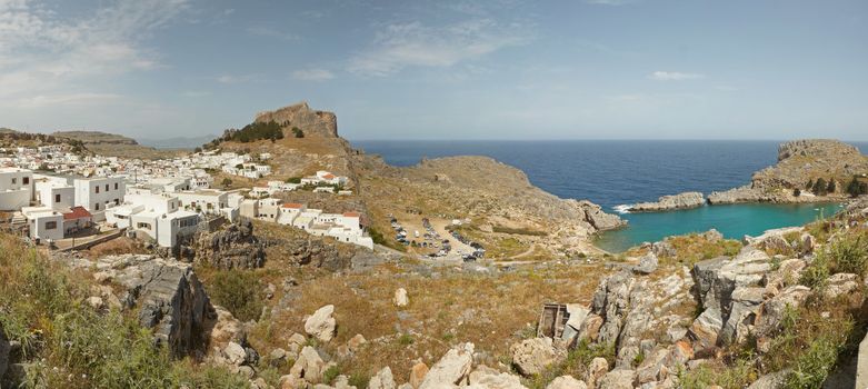 Lindos is an archaeological site, a town and a former municipality on the island of Rhodes