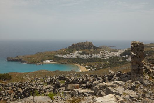 Lindos is an archaeological site, a town and a former municipality on the island of Rhodes