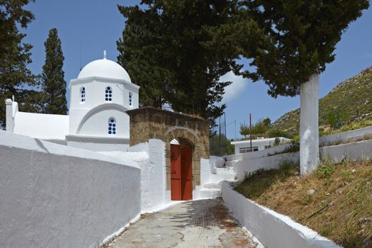 The first impression of Archangelos - or Arhangelos - is unlikely to be very positive, as it gives you the feeling of any Greek provincial town - a concrete wasteland with noisy cafos and nowhere to park.