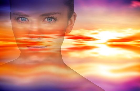 Serious blonde natural beauty against purple sky with orange clouds