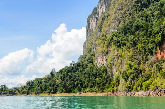 Beautiful mountain surrounded by water, Natural attractions at Ratchapapha dam in Khao Sok National Park, Surat Thani province, Guilin of Thailand.