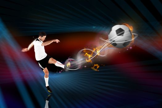 Football player in white kicking against abstract design