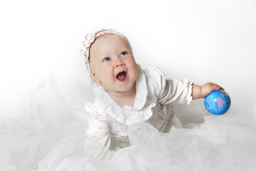 Beautiful small kid girl in studio