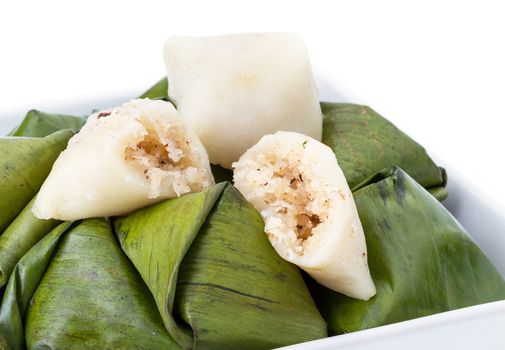 Stuffed dough pyramid thai dessert called Ka-Nhom-Tian on white background