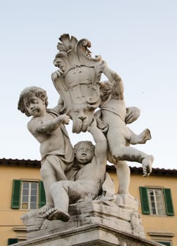 Cherub statue that sits on the Field of Miracles - Pisa, Italy.