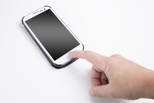 Picture of a hand touching a smartphone.