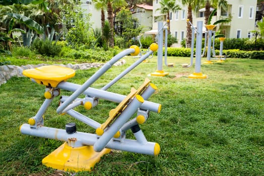 a beautiful modern fitness equipment is outdoors