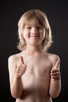 Boy with Blond Hair Showing Thumbs Up Hand Sign