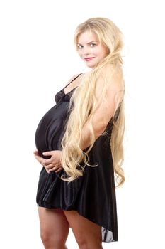 Young Pregnant Woman with Long Blond Hair in Lingerie.