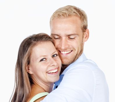 Portrait of a Happy Young Couple Smiling Looking - Isolated on White