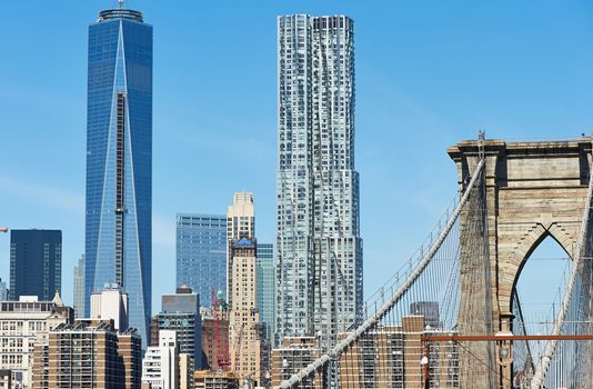 Brooklyn Bridge with lower Manhattan skyline in New York City