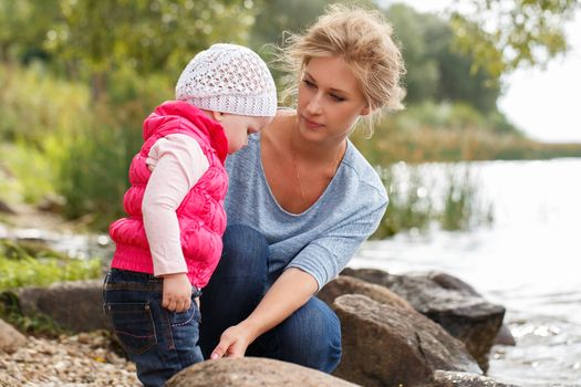 Young mother with adorable daughter